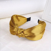 Oryginalna opaska do włosów złota supeł
